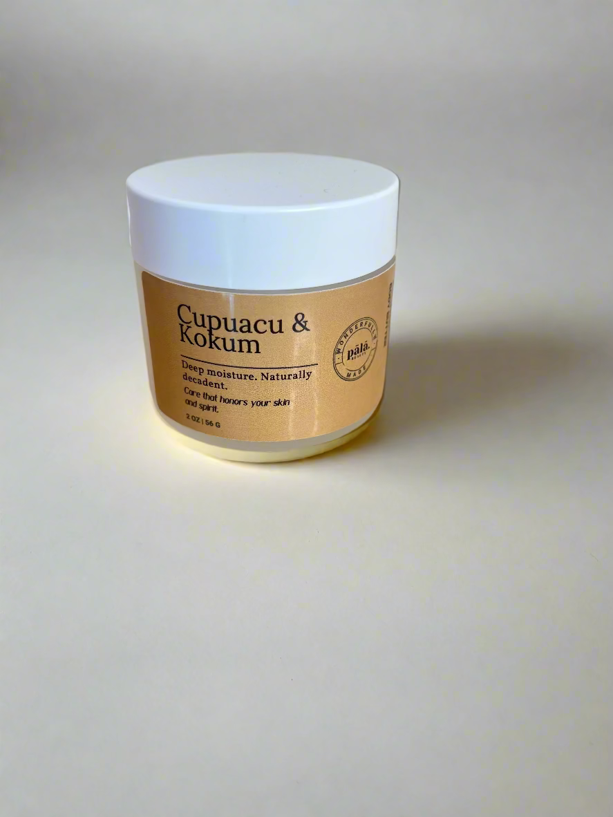Jar of Cupuacu & Kokum cream on a beige surface