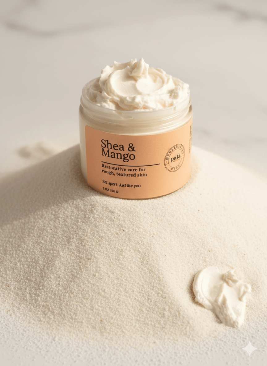Jar of Shea & Mango cream on a textured surface